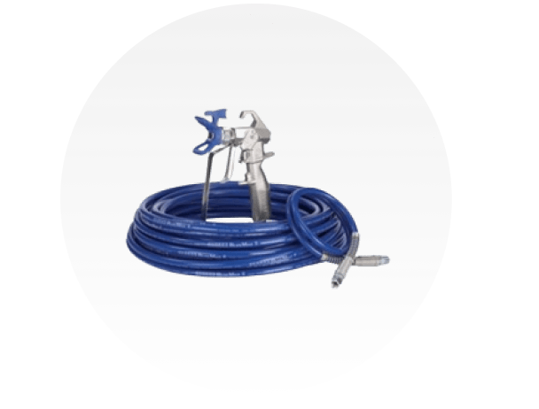 A paint sprayer with coiled up blue hose.